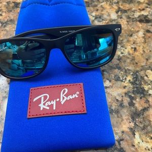 Black RayBan kids sunglasses with blue case